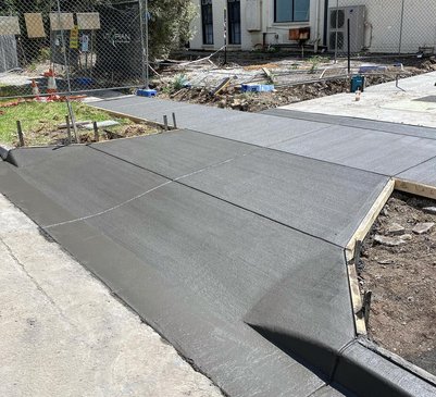 Finishing a sidewalk pour in NYC